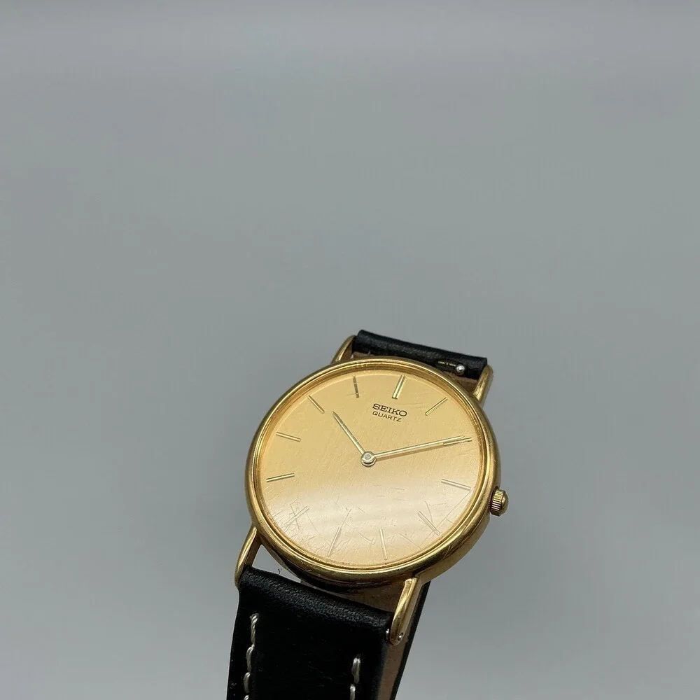 Vintage Seiko Mens Watch 31mm Gold Tone Black Leather 7N00-7A49 New Battery